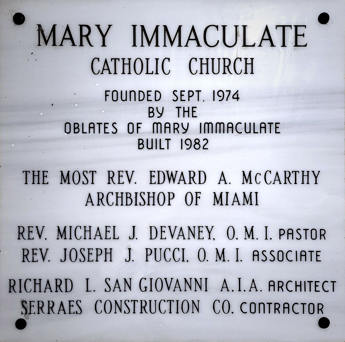 Dedication plaque: Mary Immaculate Catholic Church, founded September 1974, built 1982